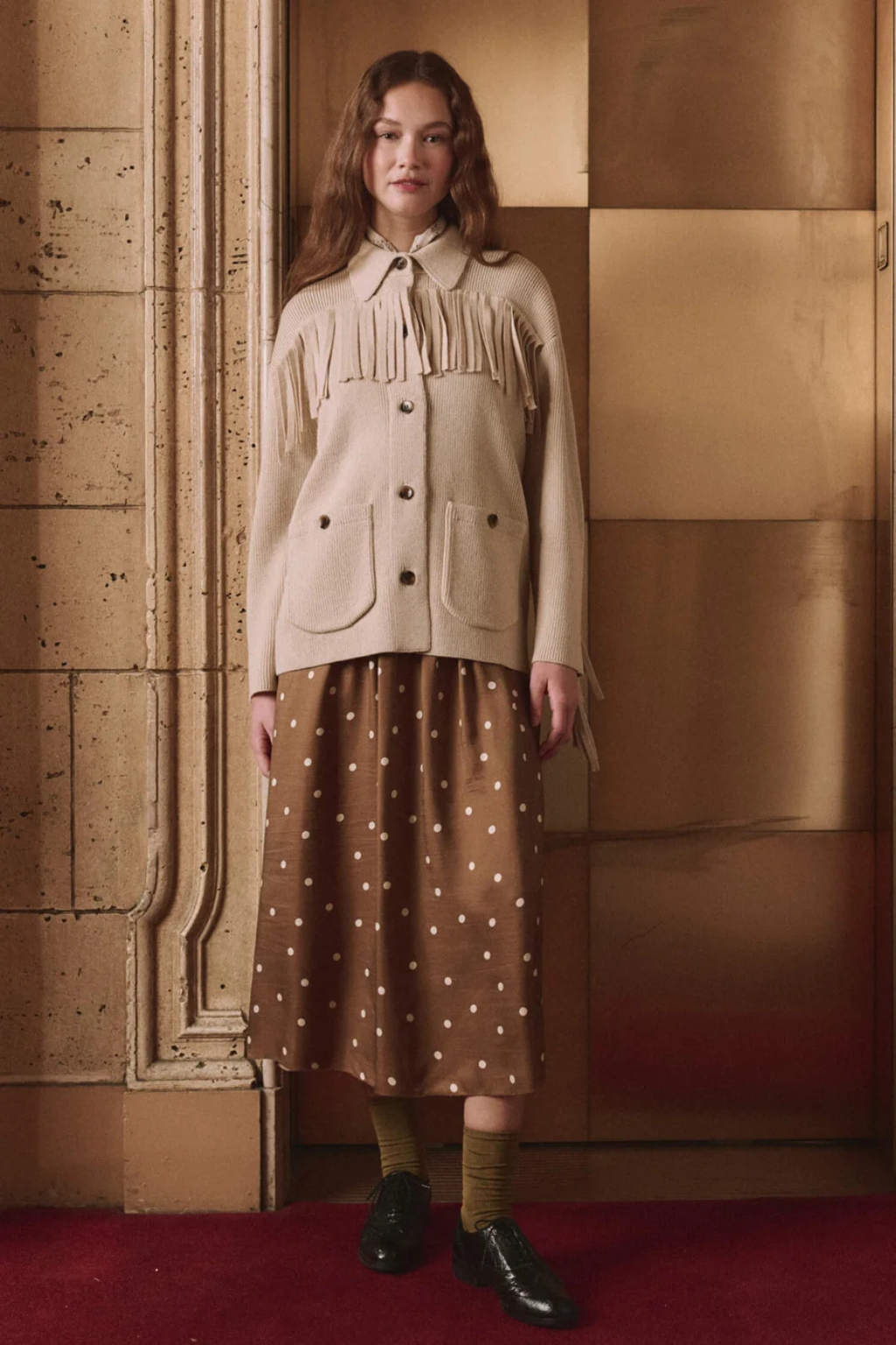 The Western Fringe Sweater Jacket.
